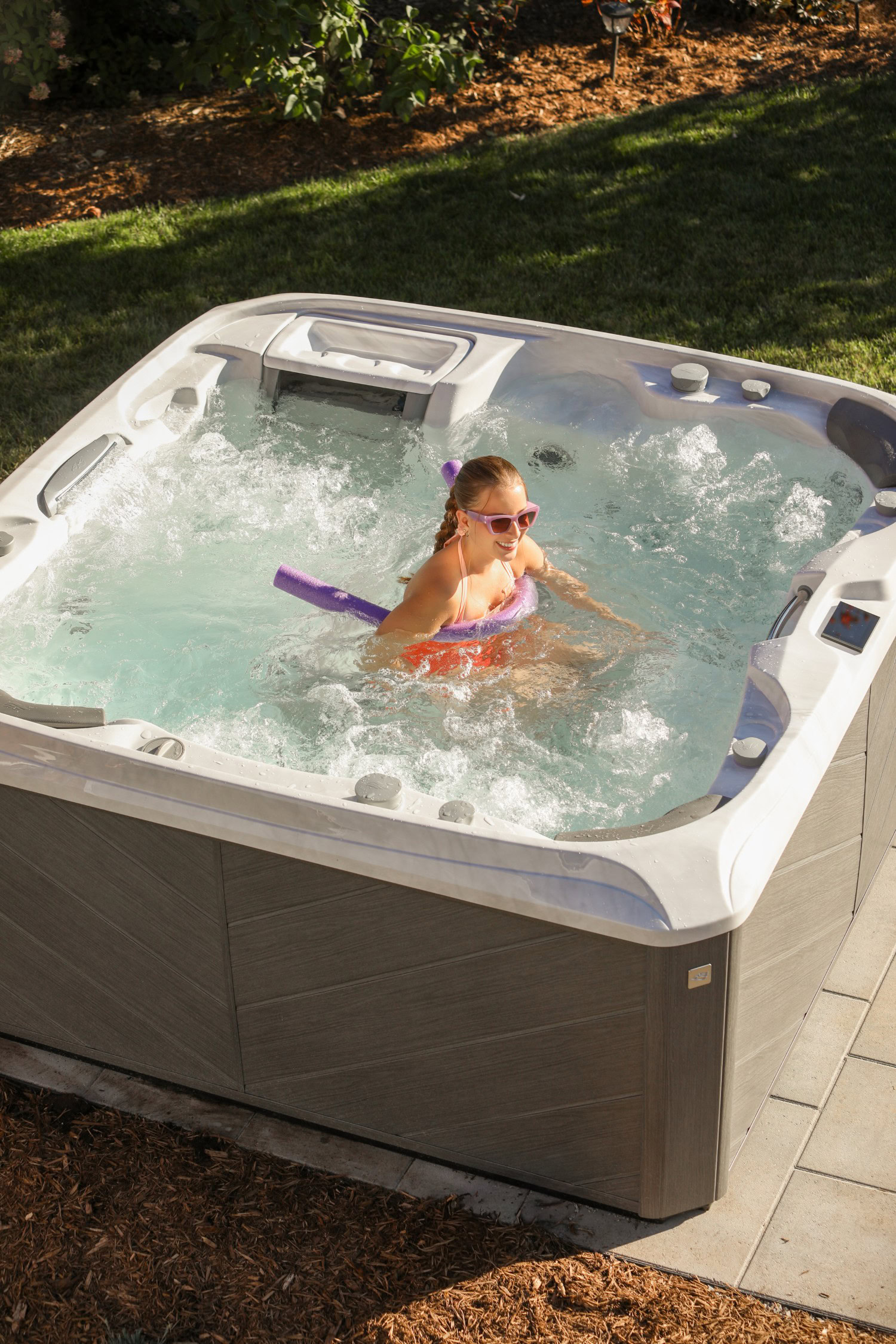 sundance spas 880 series hot tub girl relaxing 10